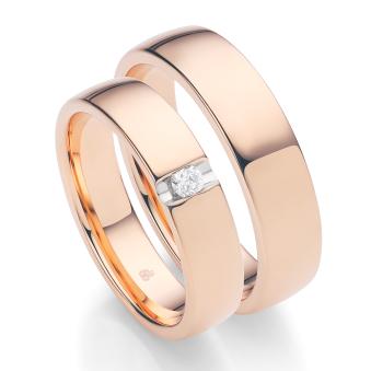 Eheringe aus Roségold mit einem Diamant 8299